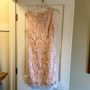 Beautiful lace on pink dress. Perfect for spring weddings.